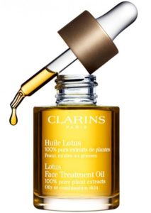 dau duong Clarins Lotus Face Treatment Oil